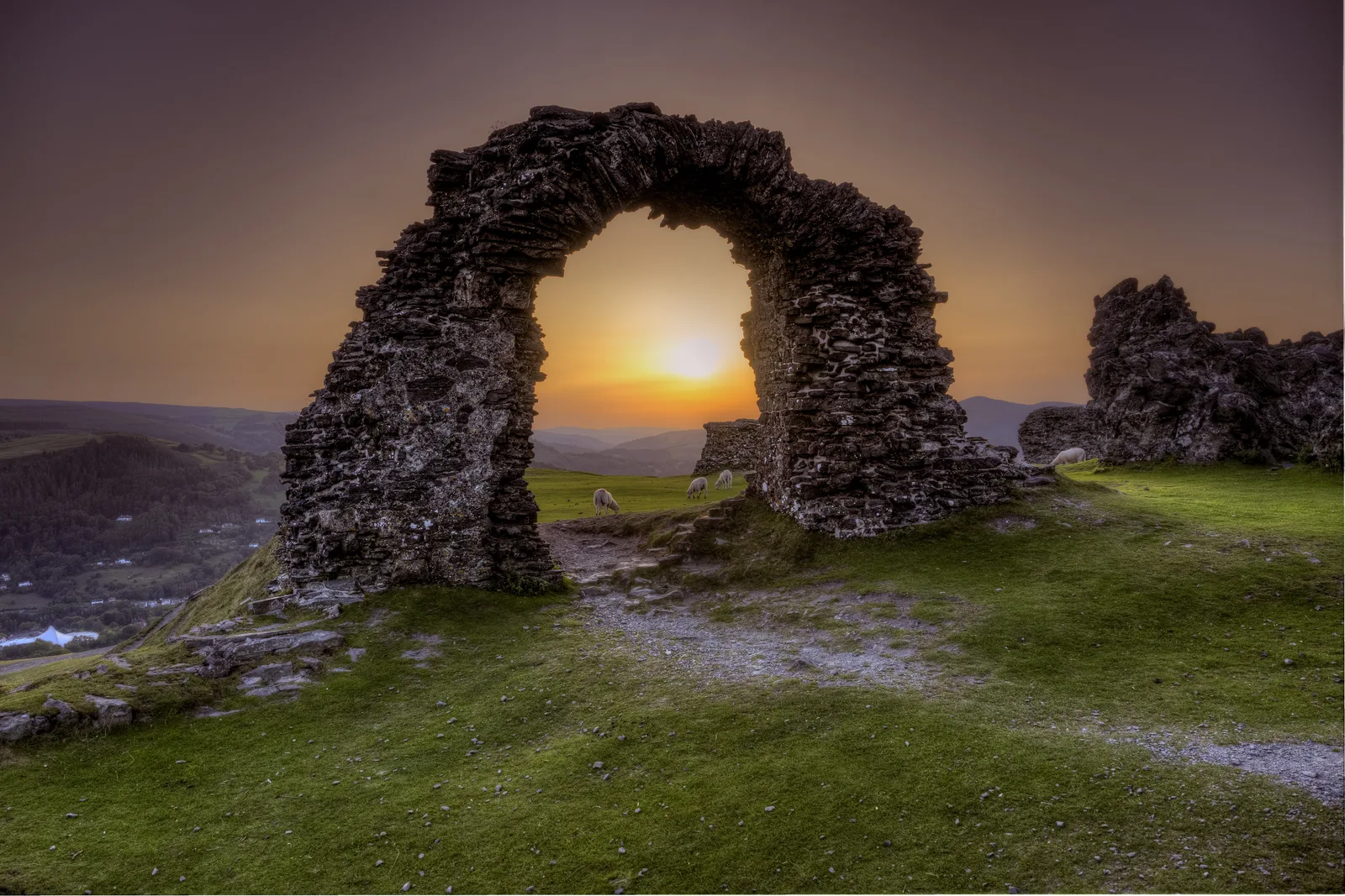 Dinas Bran stone arch at sunset